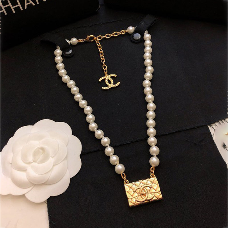 18K  Chanel Pearl Bag Pendant Necklace