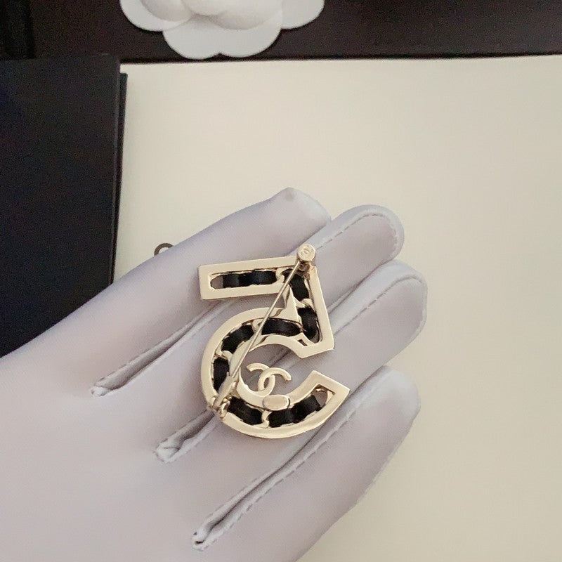 18K  Chanel No.5 Leather Diamond Brooch