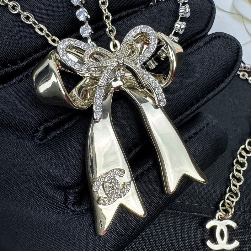 18K  Chanel 25K Bow Tie Diamond Gold Necklace