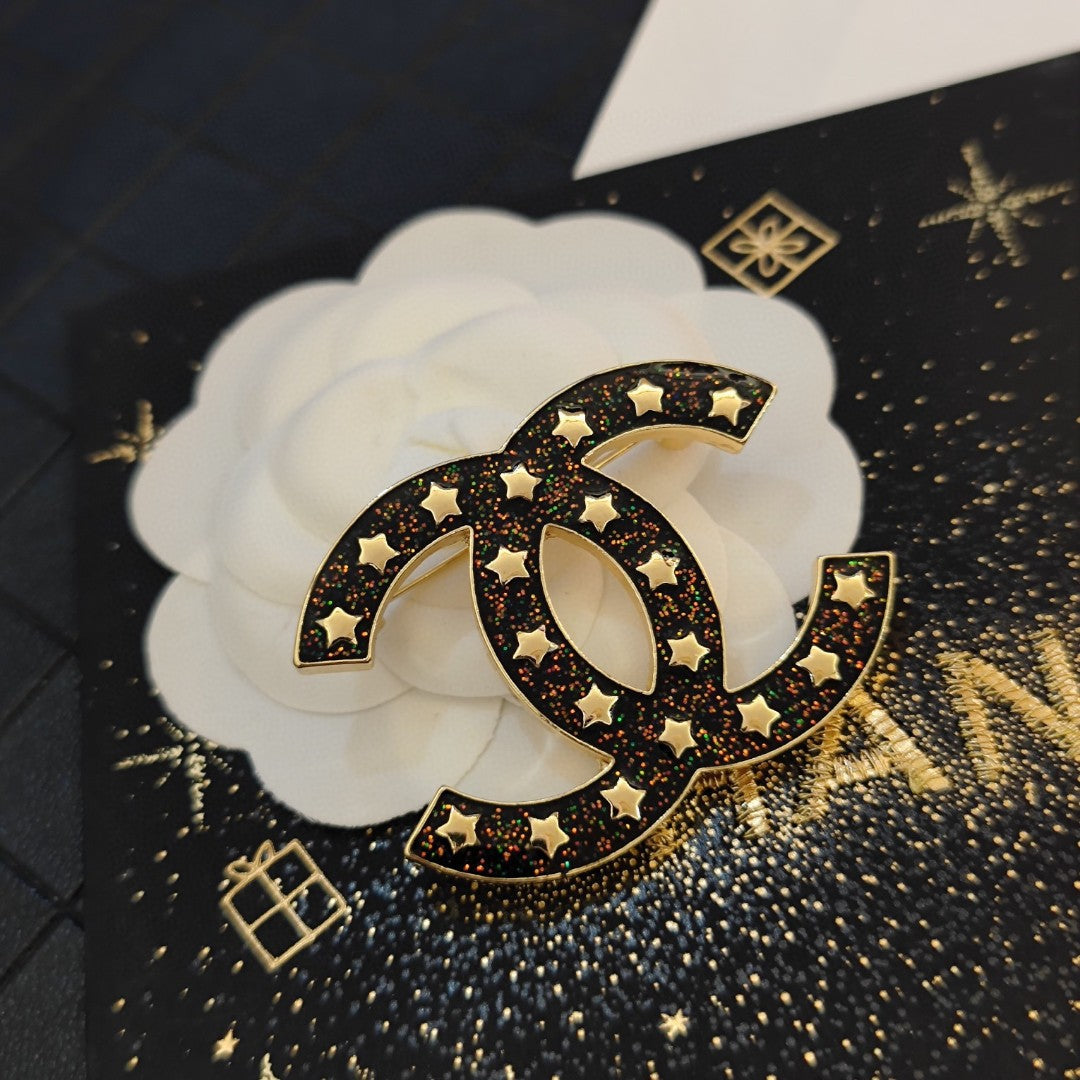 18K  Chanel Black Star Brooch